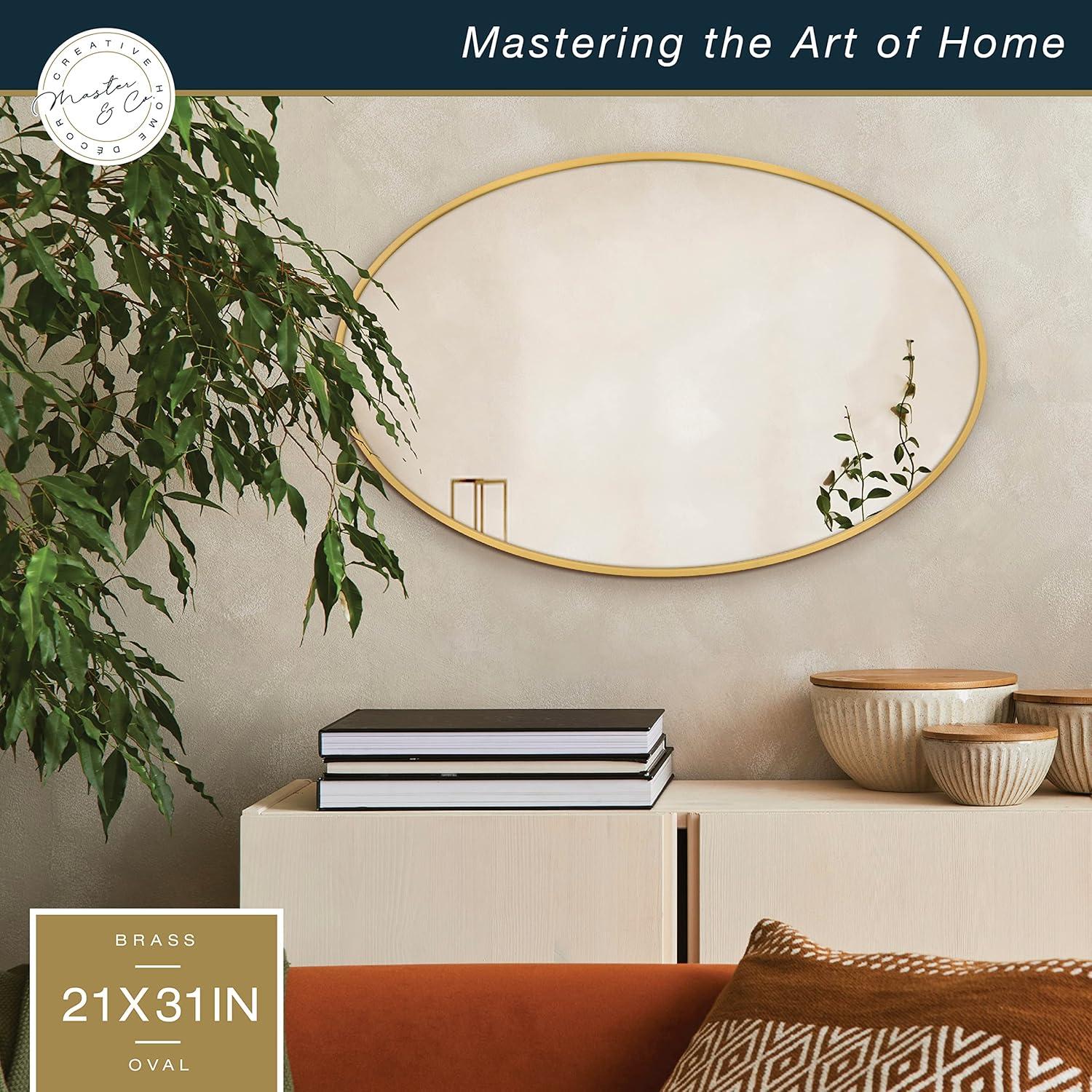 imageMCS Master ampamp Co Modern Metal Large Wall Mirror Minimalist Home Decor Oval Mirror for Living Room Bedroom or Bathroom 21 by 31 Inch Brass