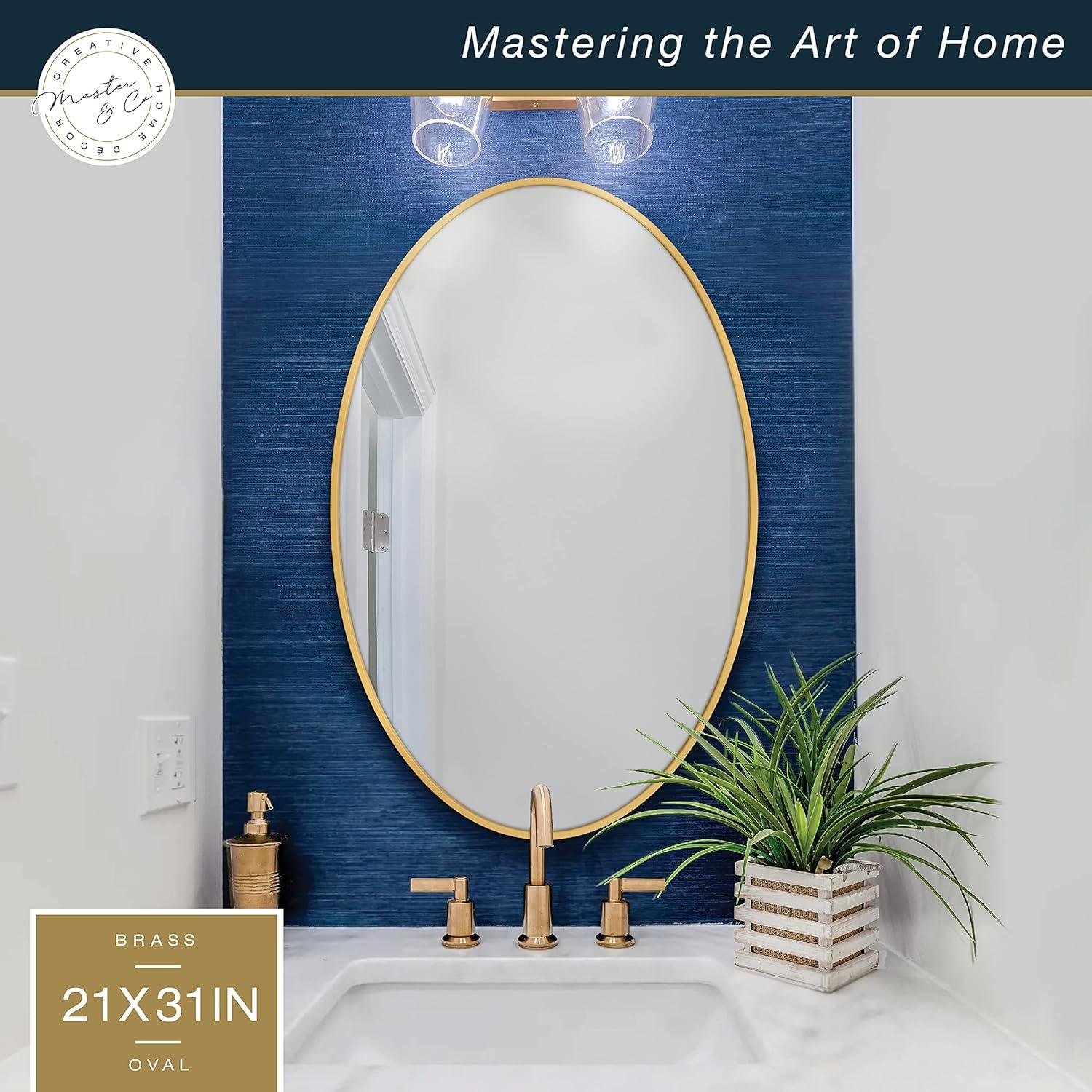 imageMCS Master ampamp Co Modern Metal Large Wall Mirror Minimalist Home Decor Oval Mirror for Living Room Bedroom or Bathroom 21 by 31 Inch Brass