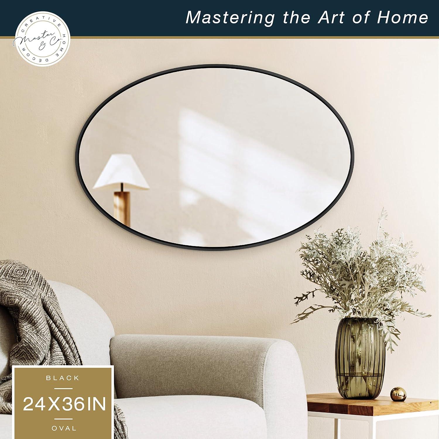 imageMCS Master ampamp Co Modern Metal Large Wall Mirror Minimalist Home Decor Oval Mirror for Living Room Bedroom or Bathroom 24 by 36 Inch Black